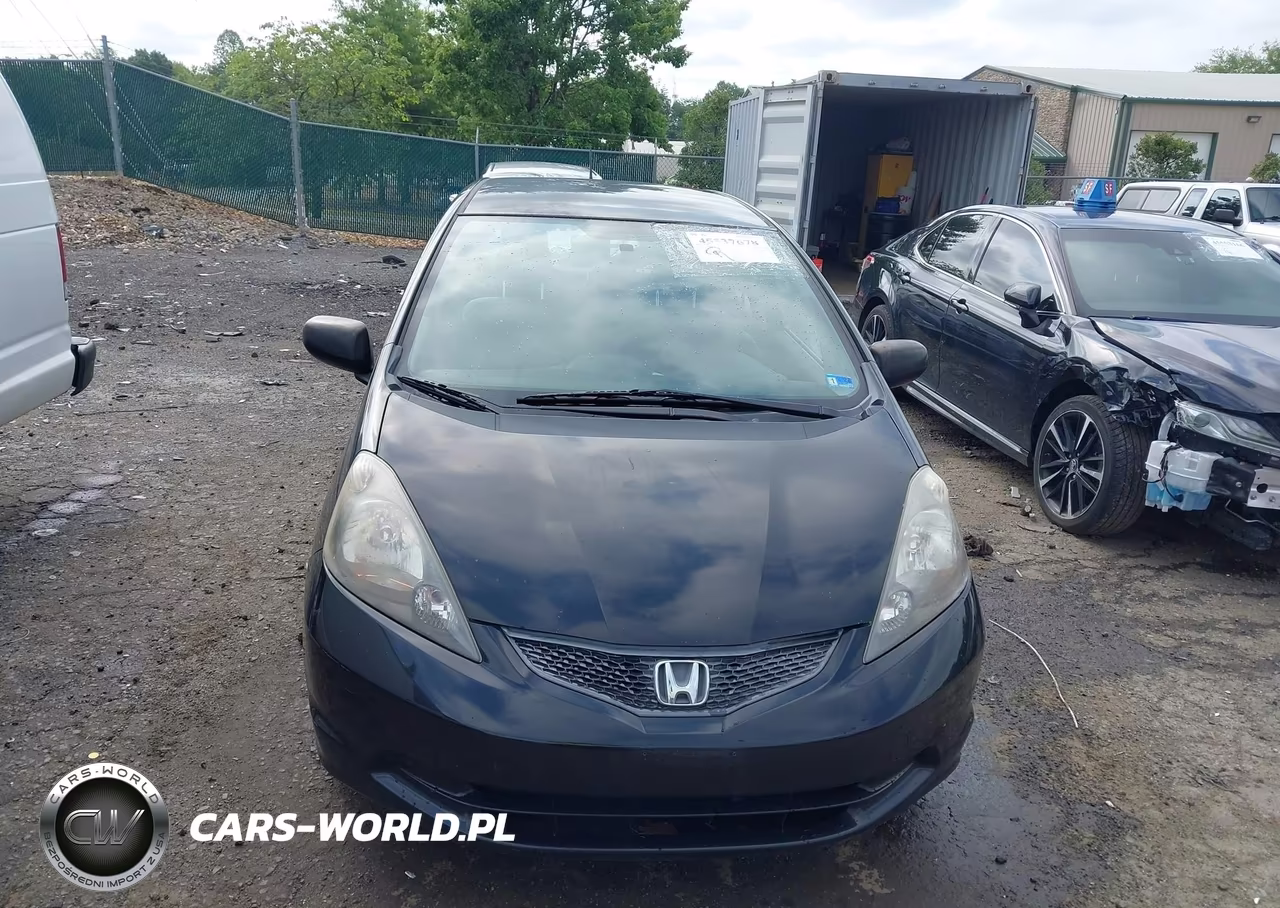 2010 Honda Fit VIN:JHMGE8H28AC005384 - 13