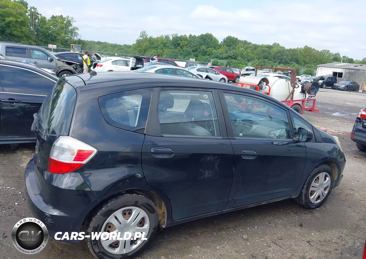 2010 Honda Fit VIN:JHMGE8H28AC005384 - 14
