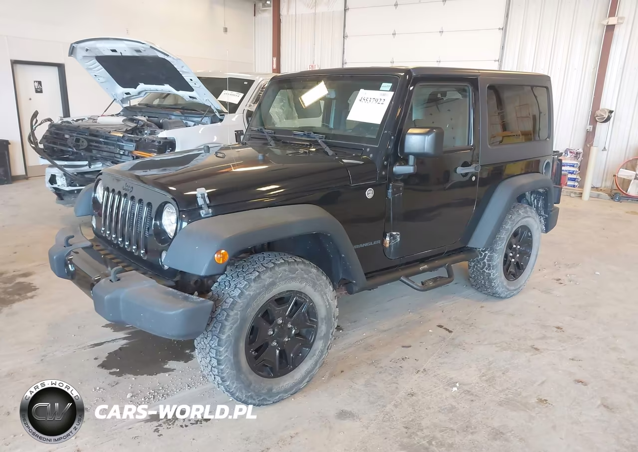 2015 Jeep Wrangler Willys Wheeler VIN:1C4AJWAG6FL565795 - 2