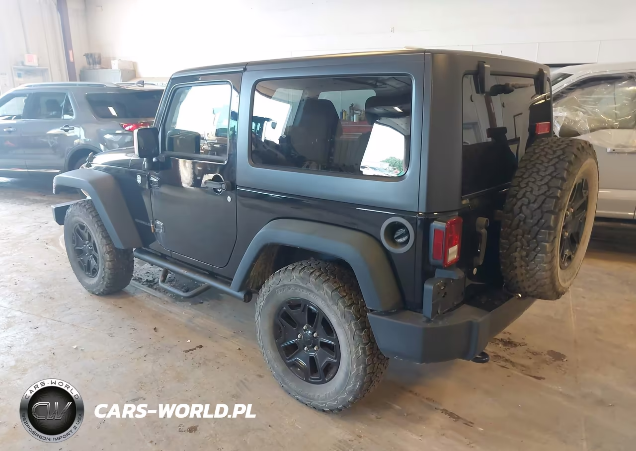 2015 Jeep Wrangler Willys Wheeler VIN:1C4AJWAG6FL565795 - 3