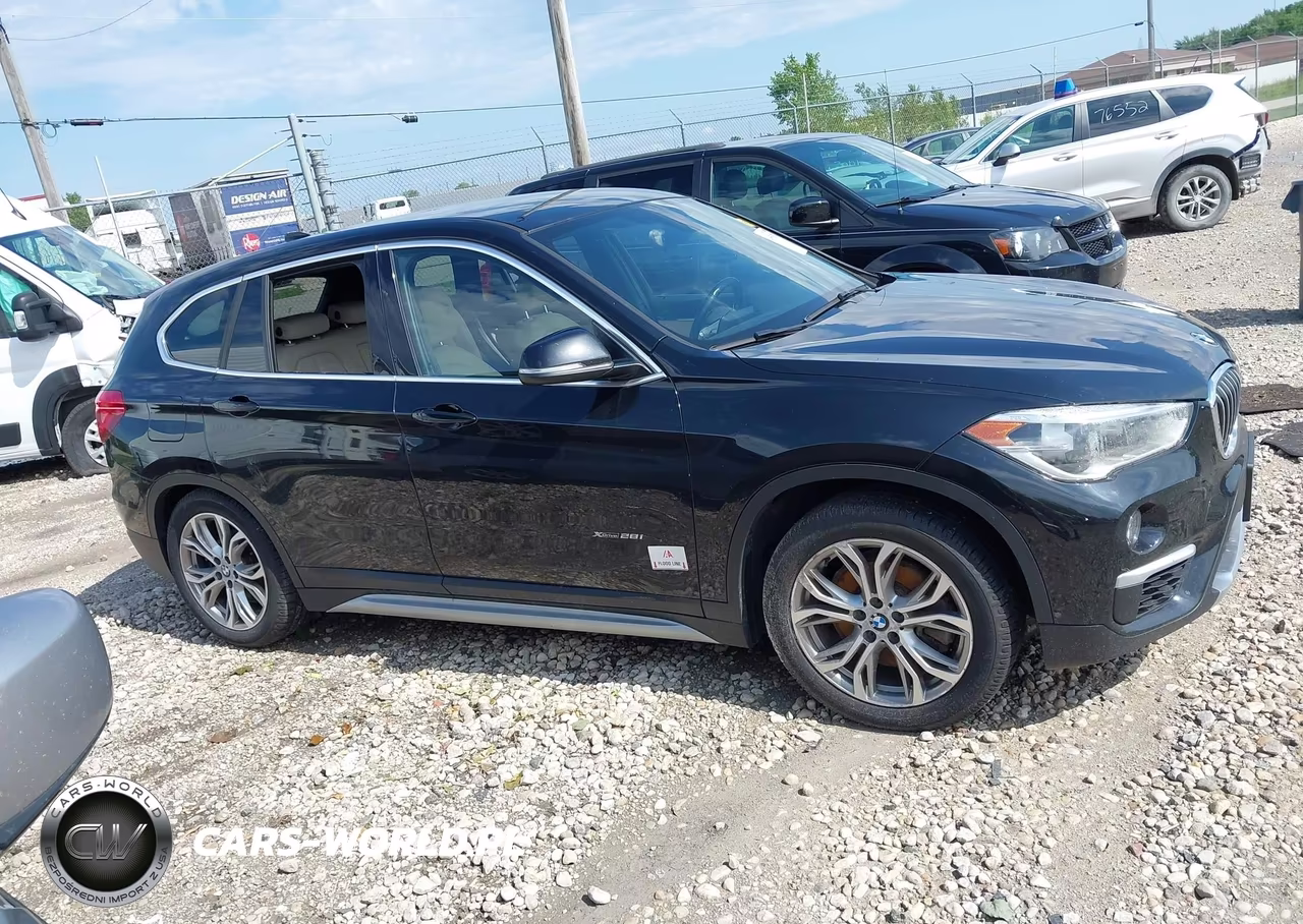 2018 BMW X1 xDrive28I VIN:WBXHT3C39J5F88198 - 13
