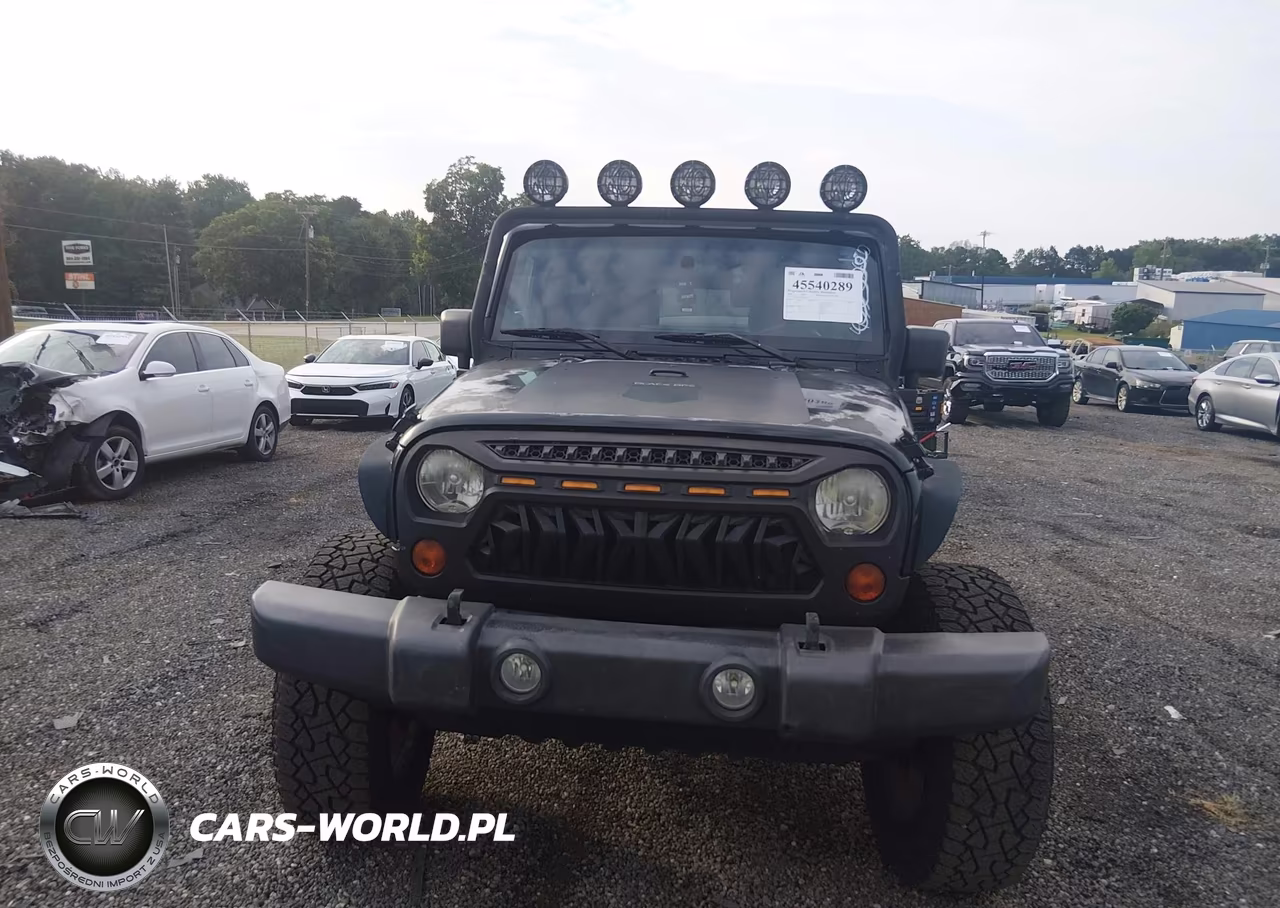 2011 Jeep Wrangler Unlimited Sport VIN:1J4HA3H1XBL610322 - 12