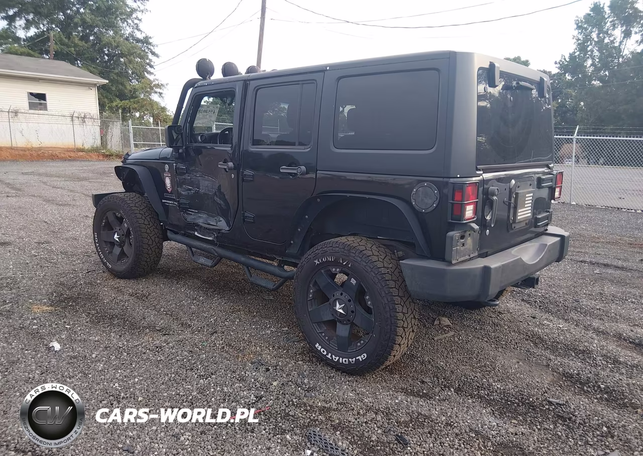 2011 Jeep Wrangler Unlimited Sport VIN:1J4HA3H1XBL610322 - 3