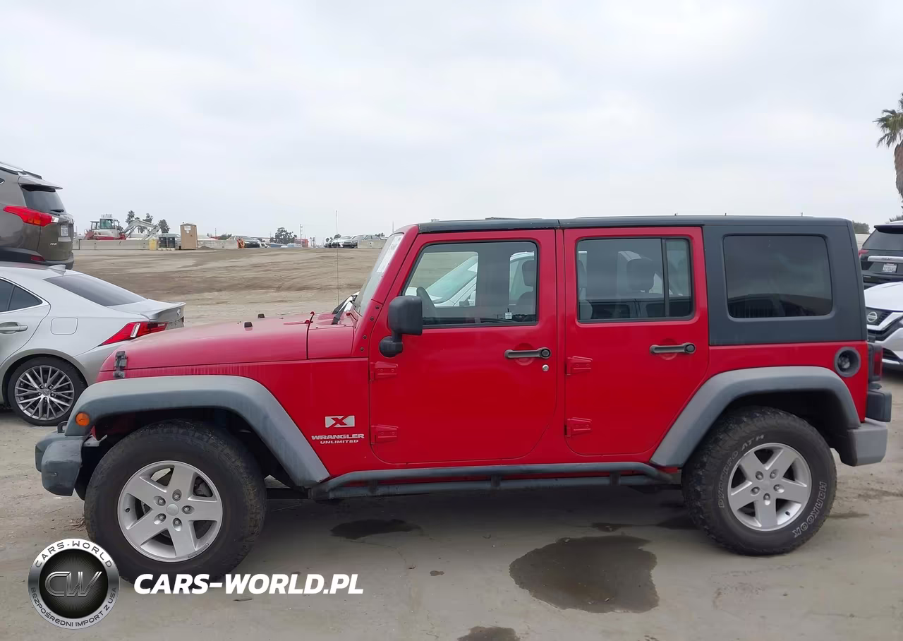 2007 Jeep Wrangler Unlimited X VIN:1J4GB39157L117341 - 14