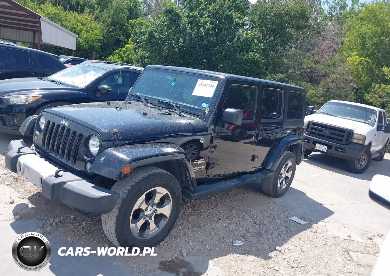 2015 Jeep Wrangler Unlimited Sahara VIN:1C4BJWEG9FL737512 - 14