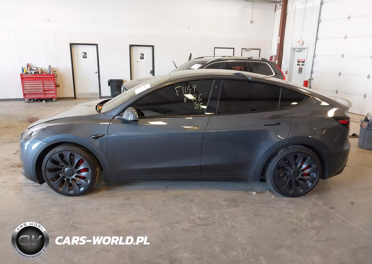 2023 Tesla Model Y Performance Dual Motor All-Wheel Drive VIN:7SAYGDEF1PF646519 - 14