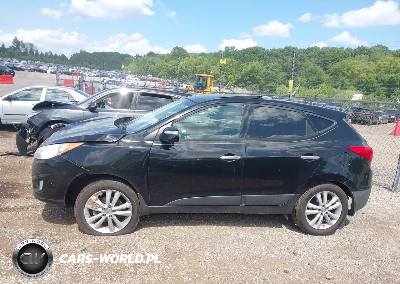 2012 Hyundai Tucson Limited VIN:KM8JUCAC3CU402641 - 14