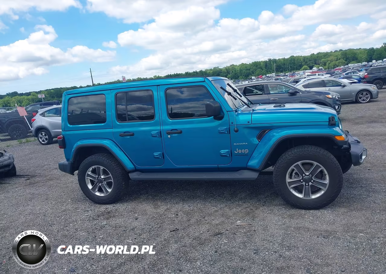 2020 Jeep Wrangler Unlimited Sahara 4X4 VIN:1C4HJXEN9LW264624 - 13