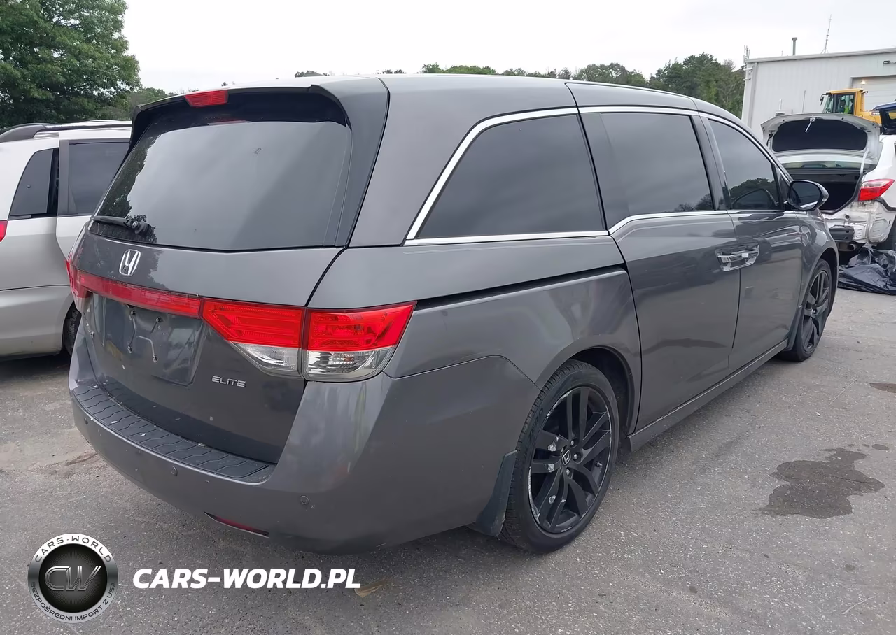 2015 Honda Odyssey Touring-Touring Elite VIN:5FNRL5H9XFB062496 - 4