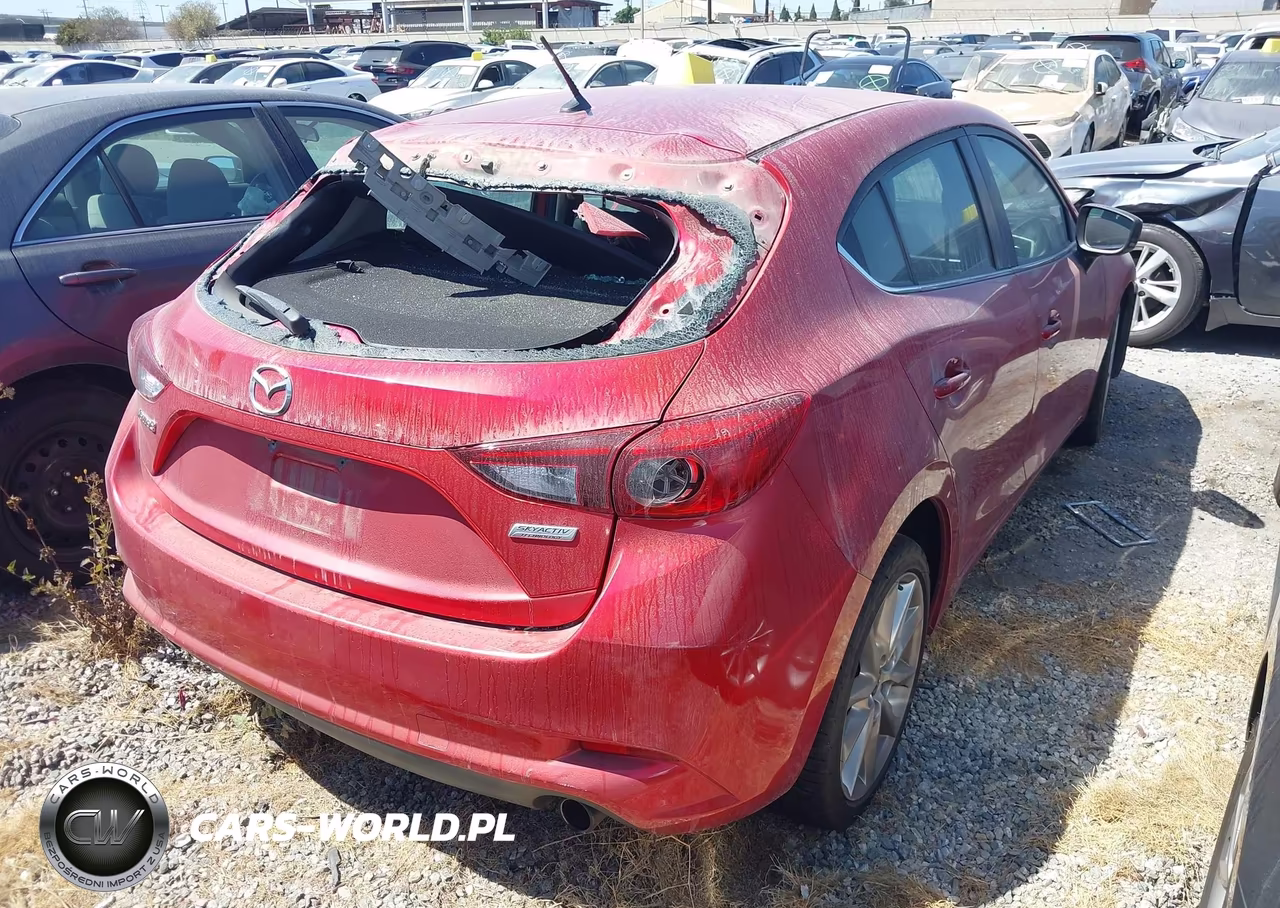 2017 Mazda Mazda3 Touring VIN:3MZBN1L7XHM114876 - 4