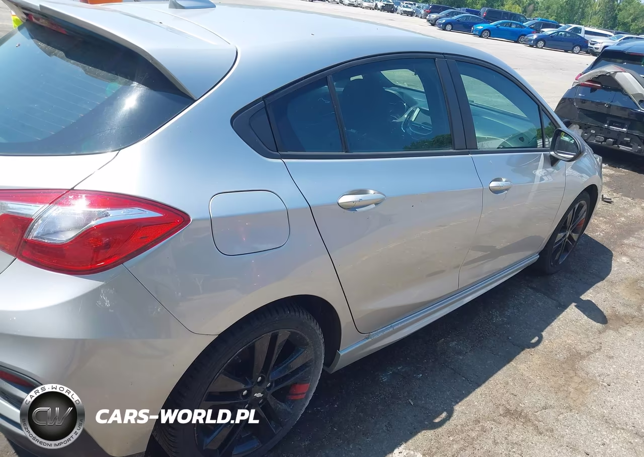 2018 Chevrolet Cruze Lt Auto VIN:3G1BE6SM9JS608129 - 4