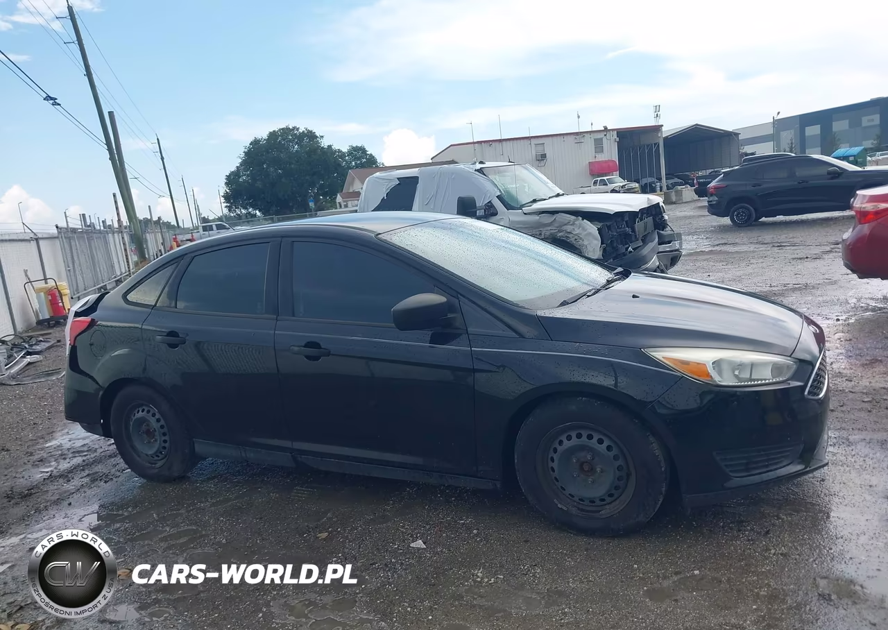 2016 Ford Focus S VIN:1FADP3E26GL250057 - 13