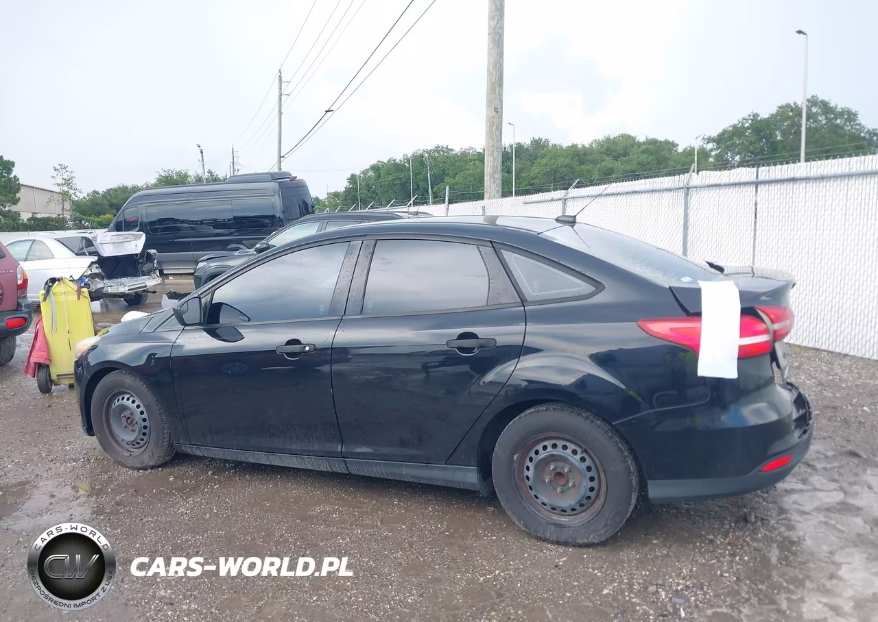 2016 Ford Focus S VIN:1FADP3E26GL250057 - 14
