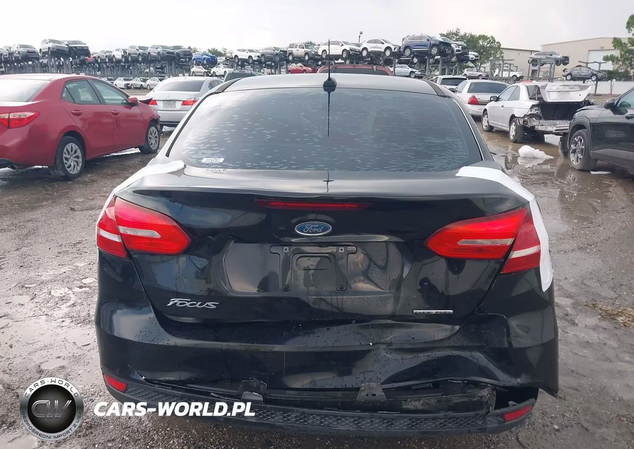 2016 Ford Focus S VIN:1FADP3E26GL250057 - 16