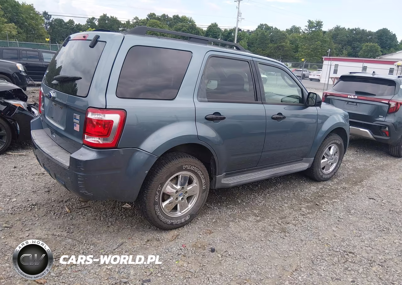 2011 Ford Escape Xlt VIN:1FMCU9D79BKB71636 - 4