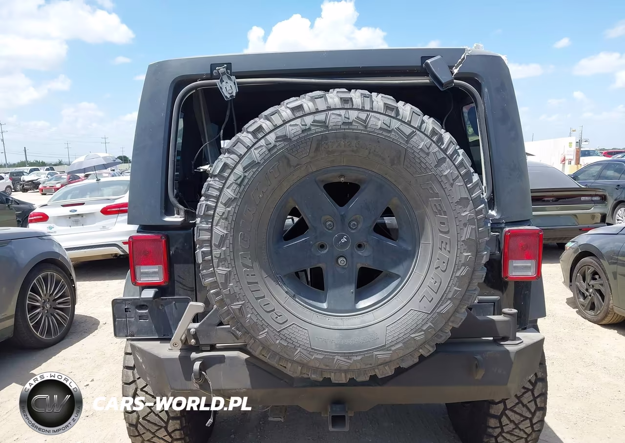 2014 Jeep Wrangler Unlimited Sport VIN:1C4BJWDG2EL244853 - 17