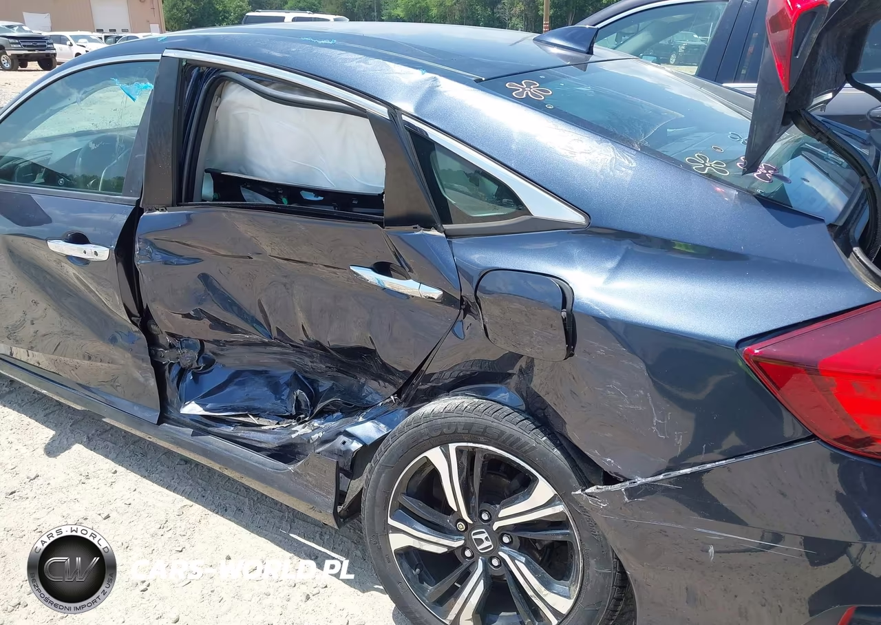 2017 Honda Civic Touring VIN:2HGFC1F95HH653820 - 6