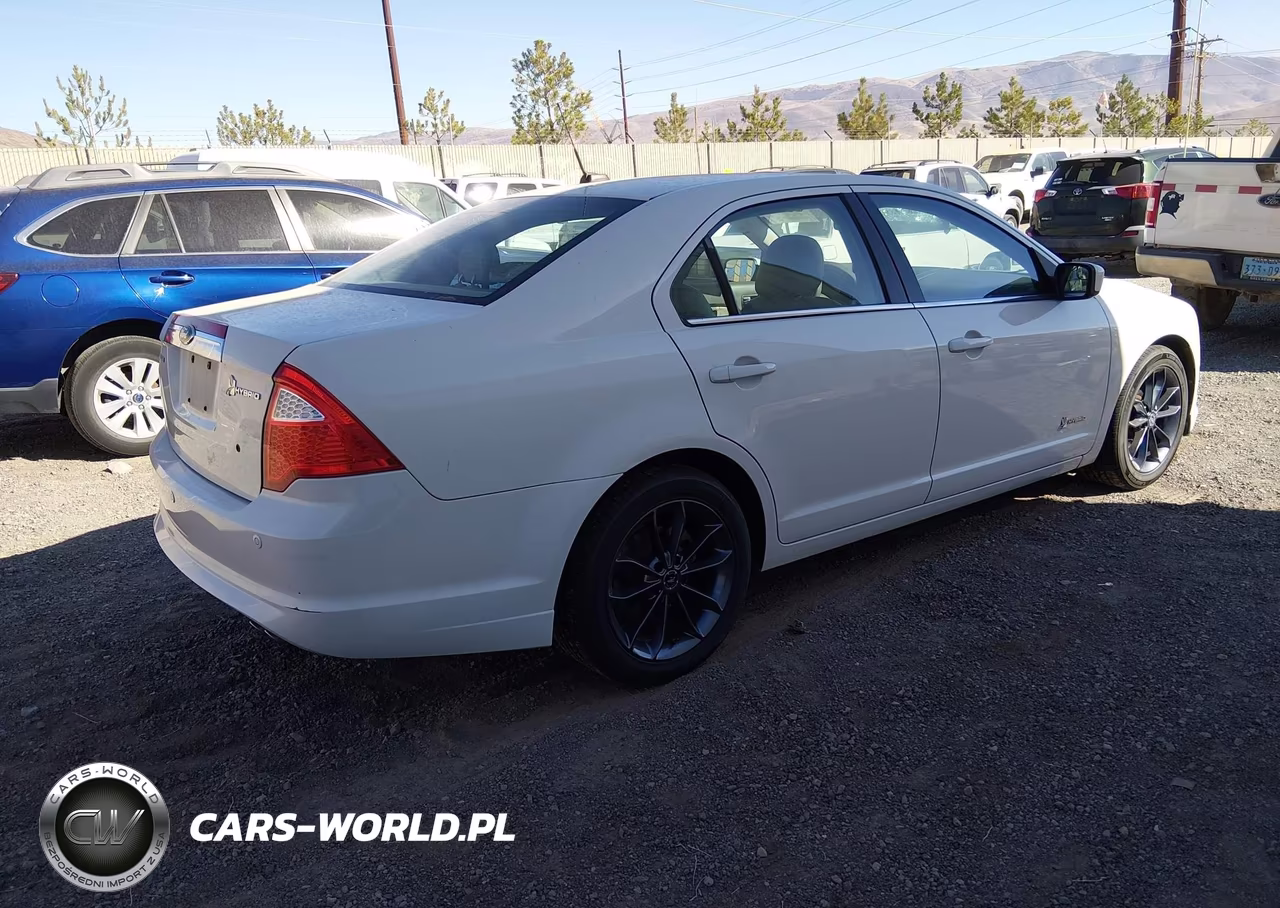 2012 Ford Fusion Hybrid VIN:3FADP0L36CR380460 - 4