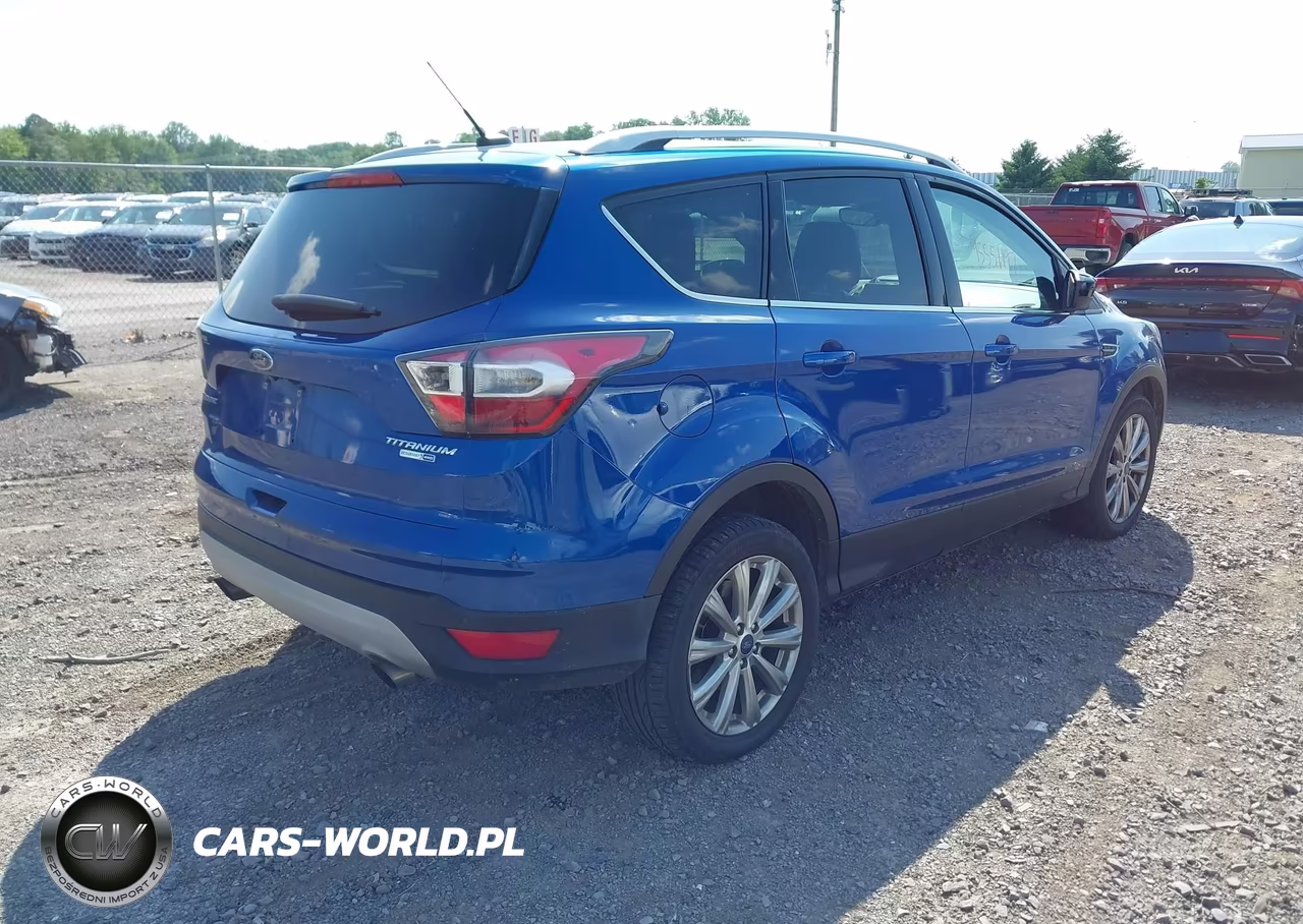 2017 Ford Escape Titanium VIN:1FMCU9JD8HUA37174 - 4