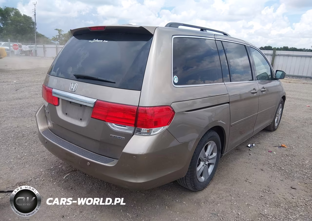 2010 Honda Odyssey Touring VIN:5FNRL3H96AB033820 - 4