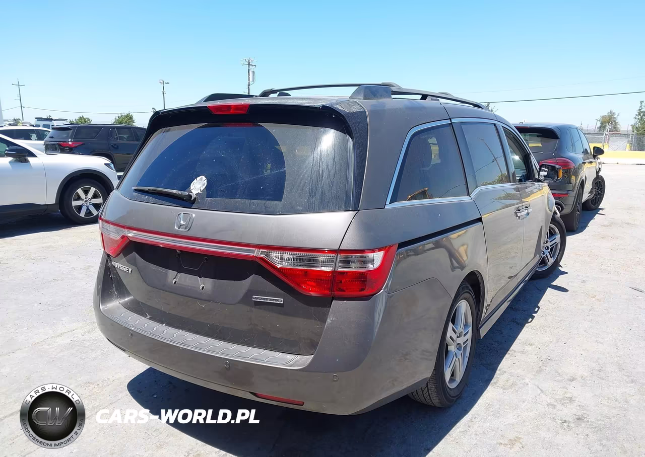 2011 Honda Odyssey Touring-Touring Elite VIN:5FNRL5H93BB056629 - 4