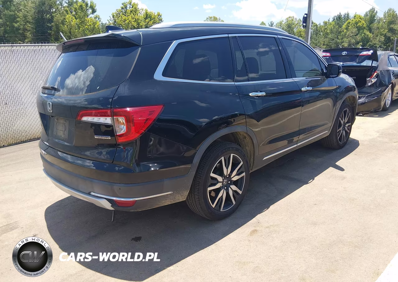 2019 Honda Pilot Touring VIN:5FNYF5H64KB042957 - 4