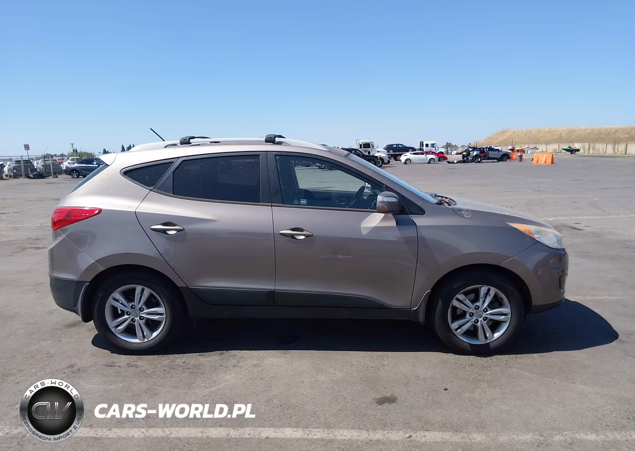 2012 Hyundai Tucson Gls VIN:KM8JUCAC6CU326719 - 13