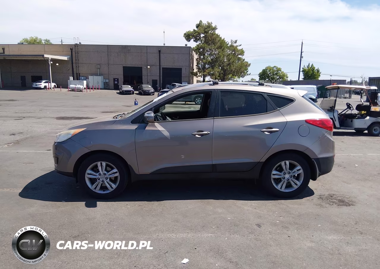 2012 Hyundai Tucson Gls VIN:KM8JUCAC6CU326719 - 14