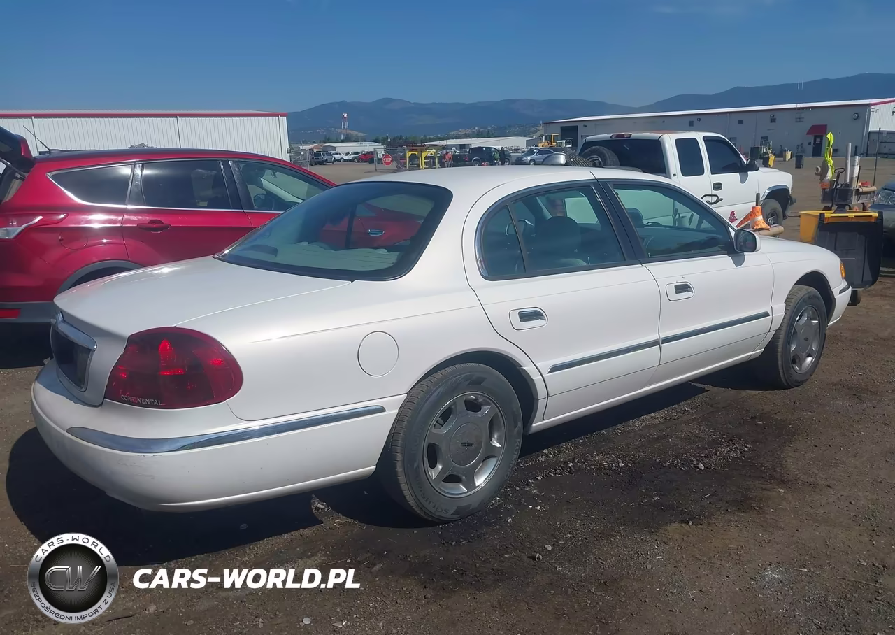 2000 Lincoln Continental VIN:1LNHM97V7YY840427 - 4