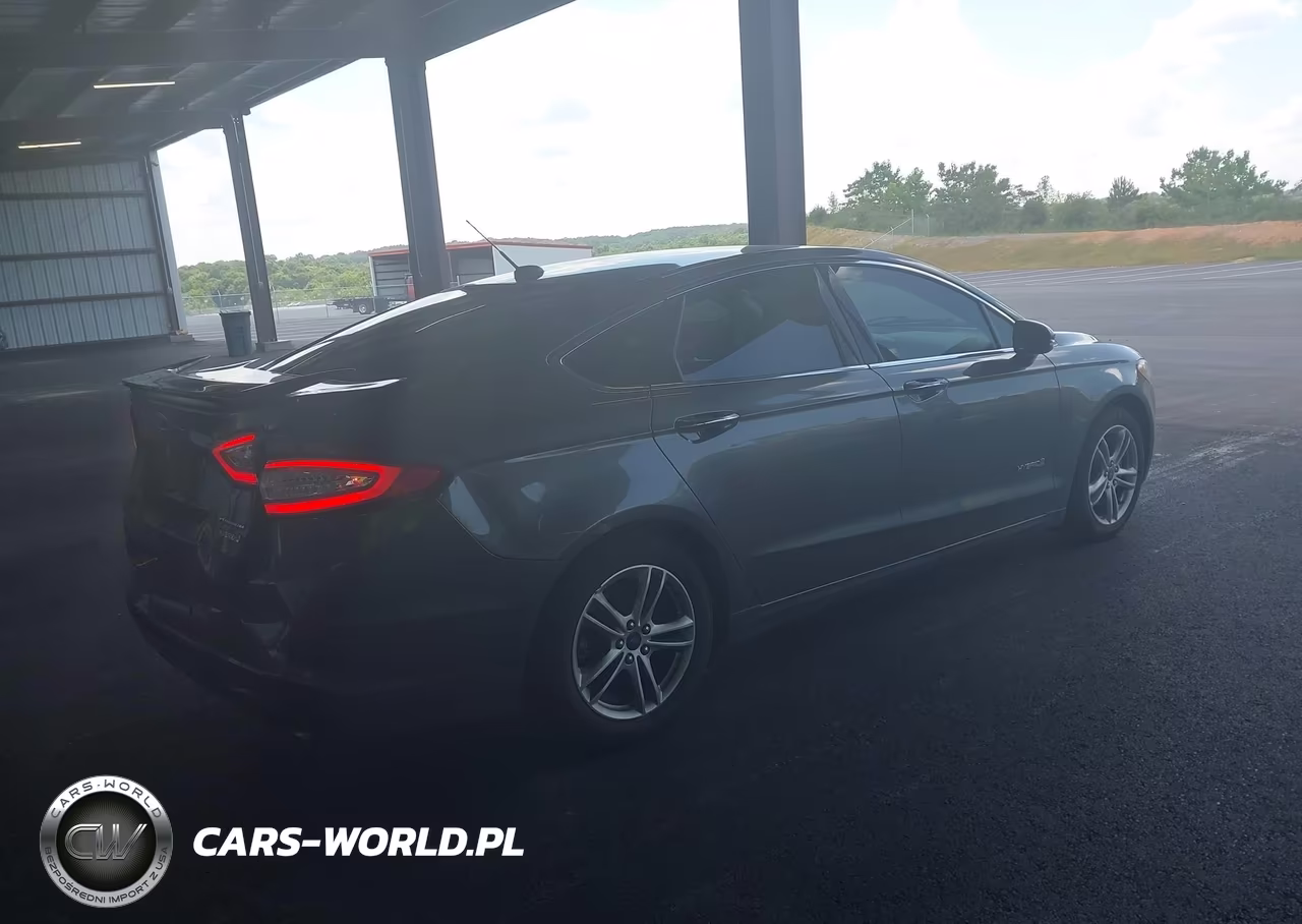 2015 Ford Fusion Hybrid Titanium VIN:3FA6P0RU1FR199019 - 4