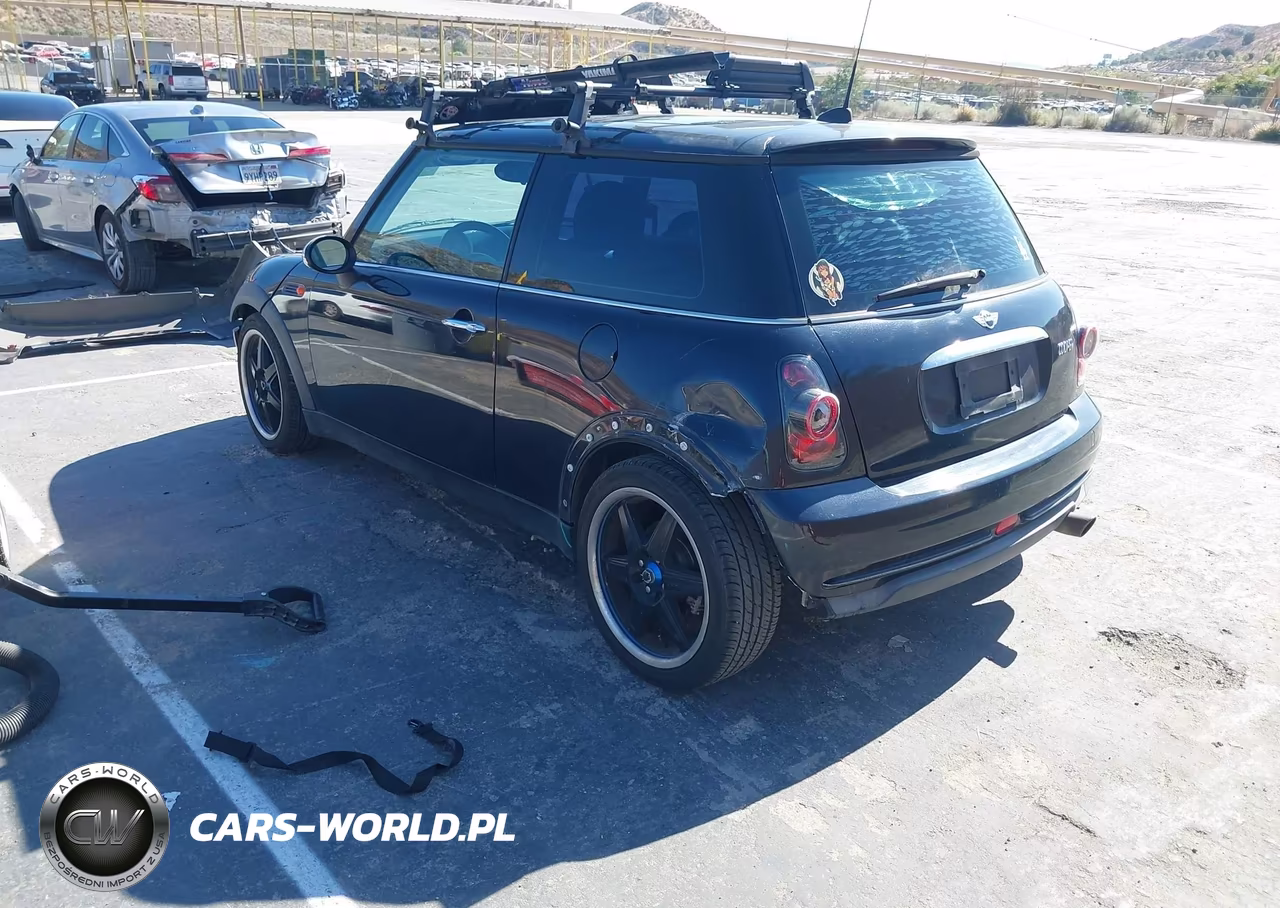 2006 Mini Cooper VIN:WMWRC33526TJ78696 - 3