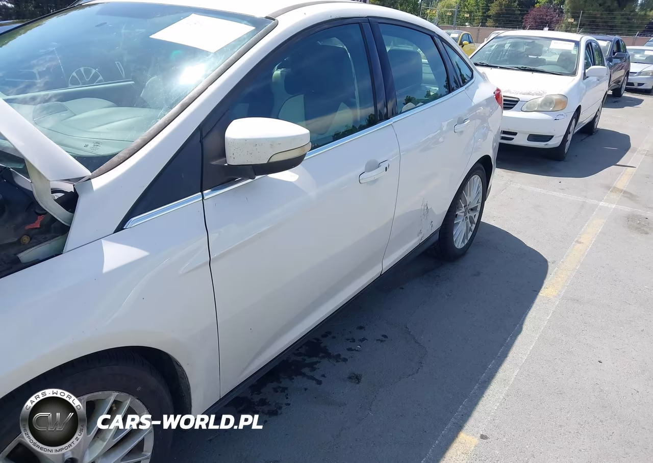 2013 Ford Focus Titanium VIN:1FADP3J29DL235683 - 6