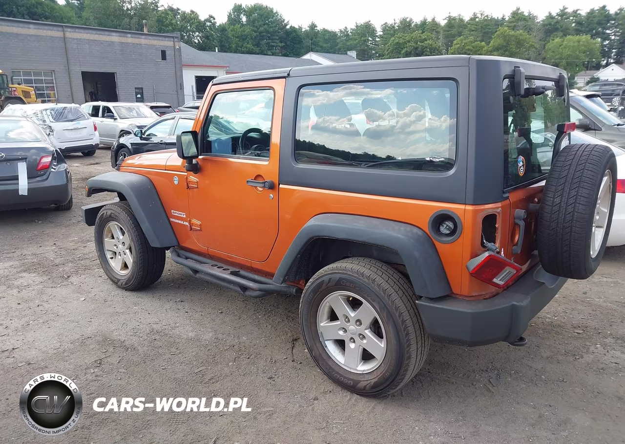 2011 Jeep Wrangler Sport VIN:1J4AA2D19BL629025 - 3