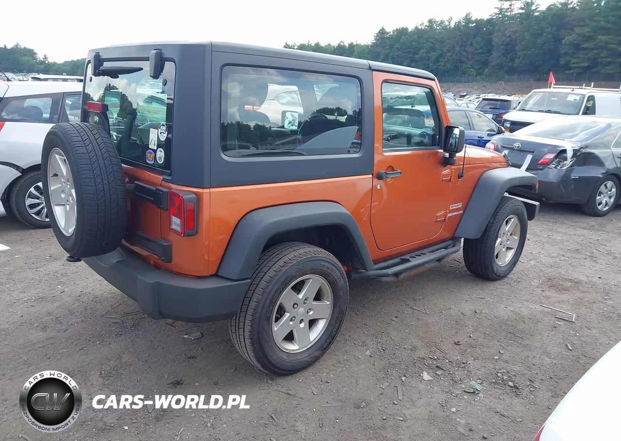 2011 Jeep Wrangler Sport VIN:1J4AA2D19BL629025 - 4