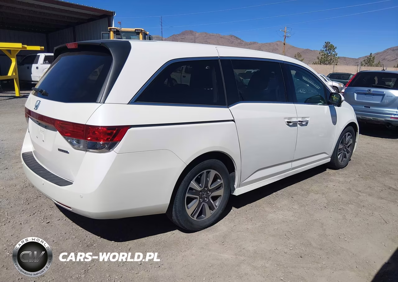 2016 Honda Odyssey Touring-Touring Elite VIN:5FNRL5H99GB009371 - 4
