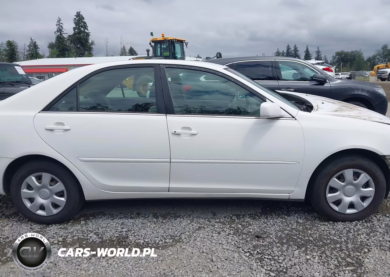 2002 Toyota Camry Le VIN:JTDBE32K120038141 - 14