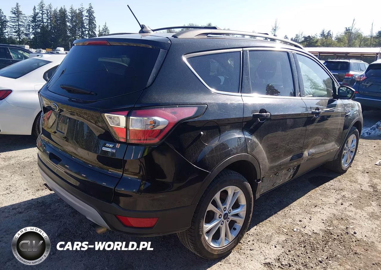 2018 Ford Escape Se VIN:1FMCU9GD8JUA86811 - 4