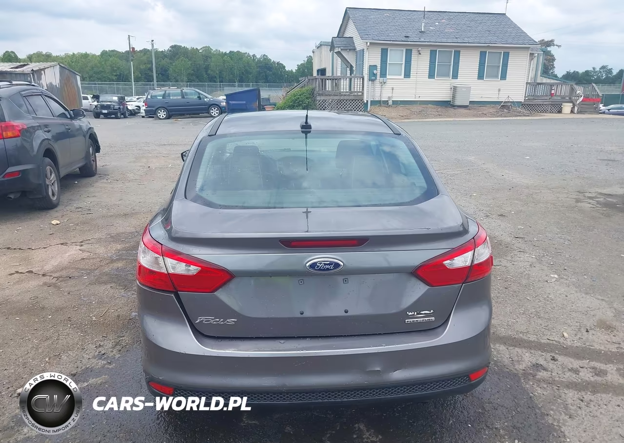 2013 Ford Focus S VIN:1FADP3E20DL217972 - 17