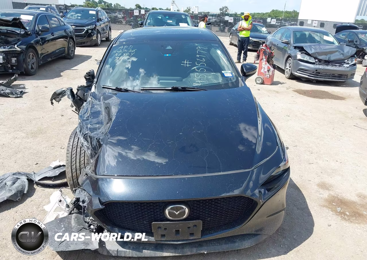 2021 Mazda Mazda3 Premium VIN:JM1BPBML2M1307965 - 11