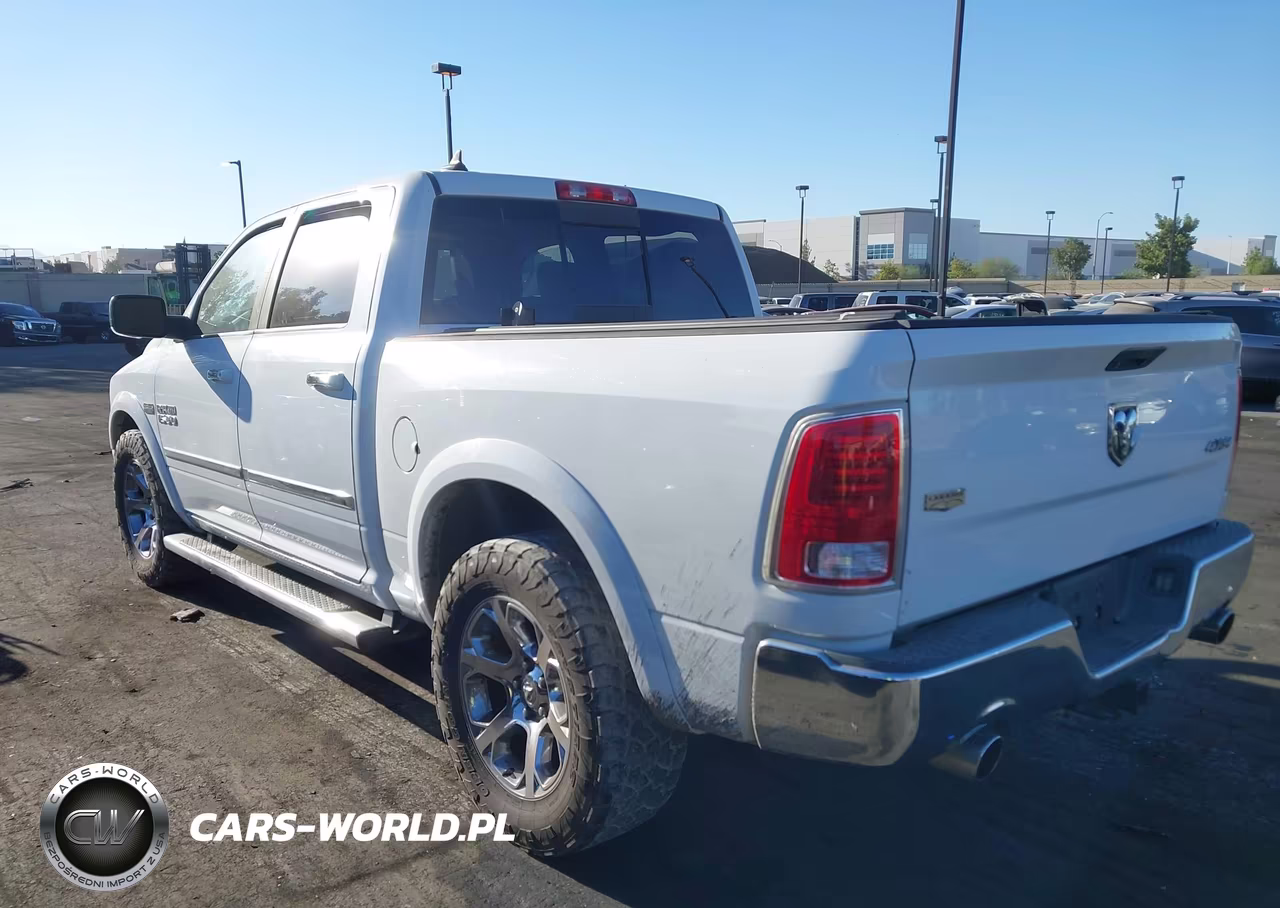 2015 Ram 1500 Laramie VIN:1C6RR7NT8FS602495 - 14