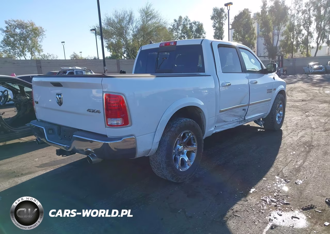 2015 Ram 1500 Laramie VIN:1C6RR7NT8FS602495 - 4