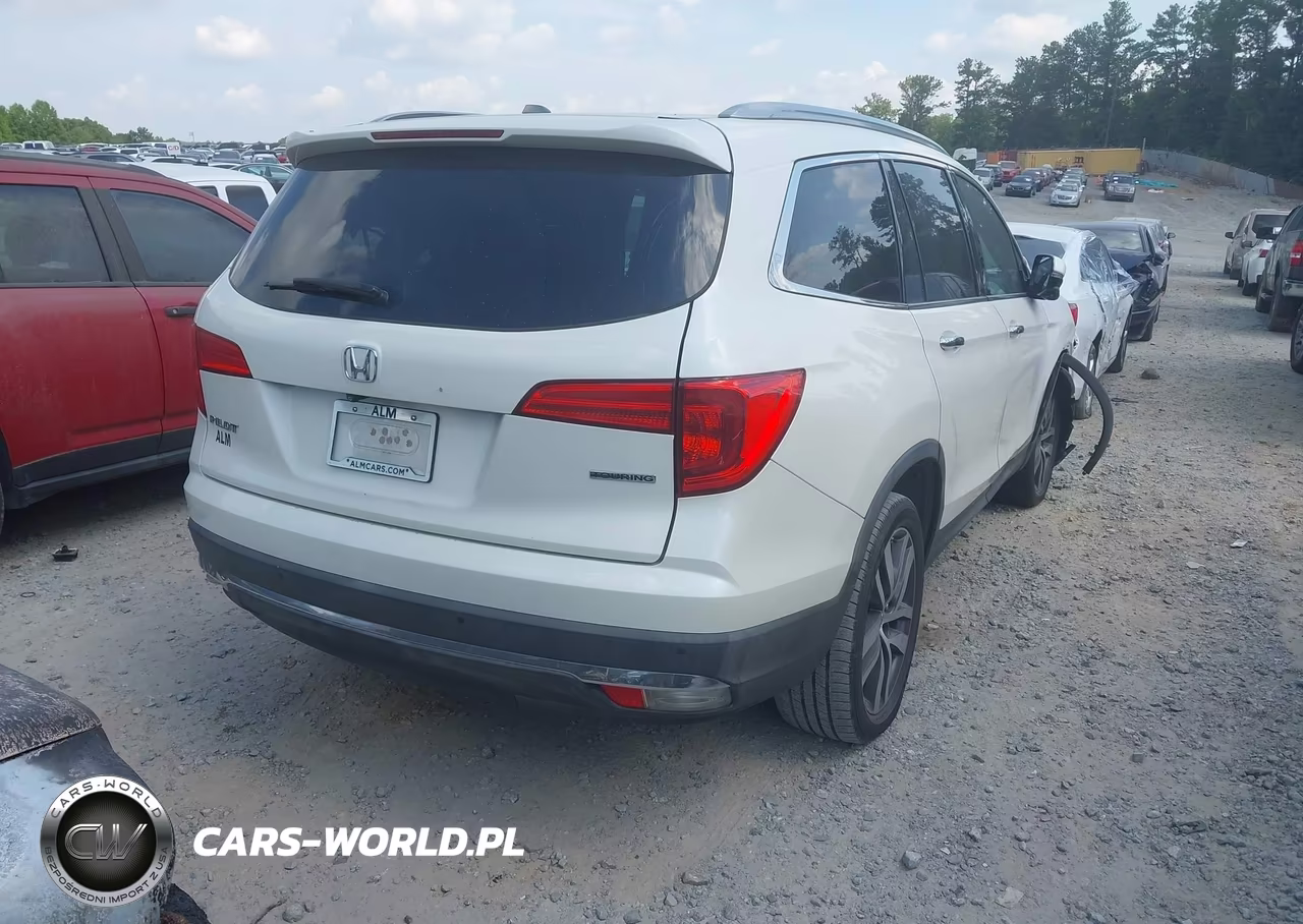 2016 Honda Pilot Touring VIN:5FNYF5H95GB013355 - 4