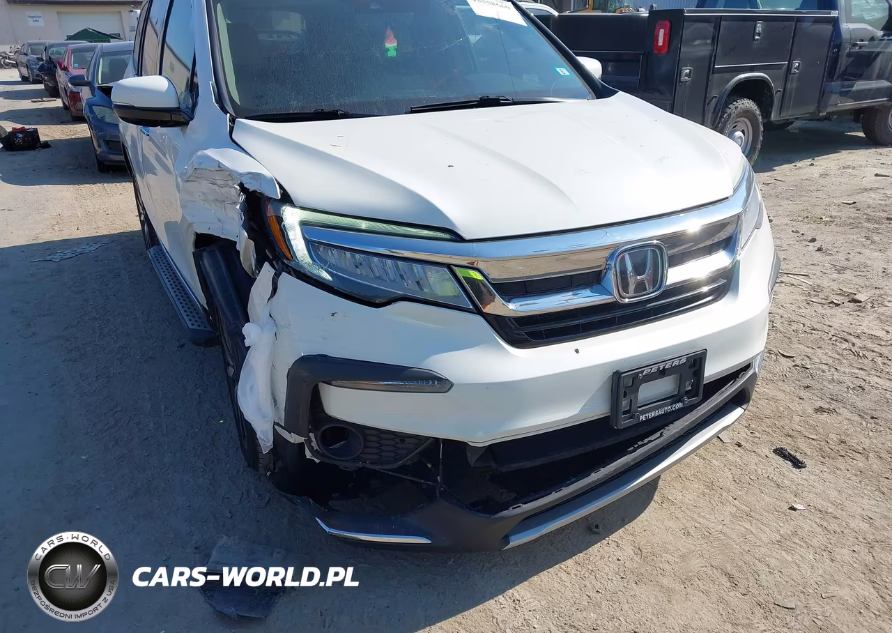 2019 Honda Pilot Touring VIN:5FNYF6H64KB034704 - 6