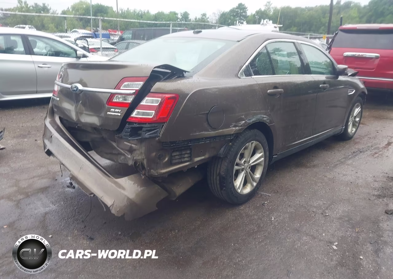 2015 Ford Taurus Sel VIN:1FAHP2E88FG101673 - 4