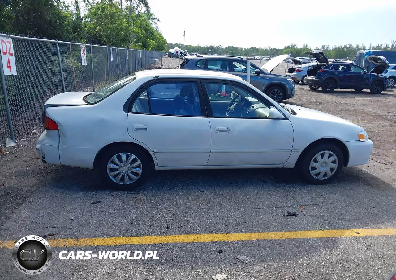 2001 Toyota Corolla Le VIN:1NXBR12E51Z563869 - 13