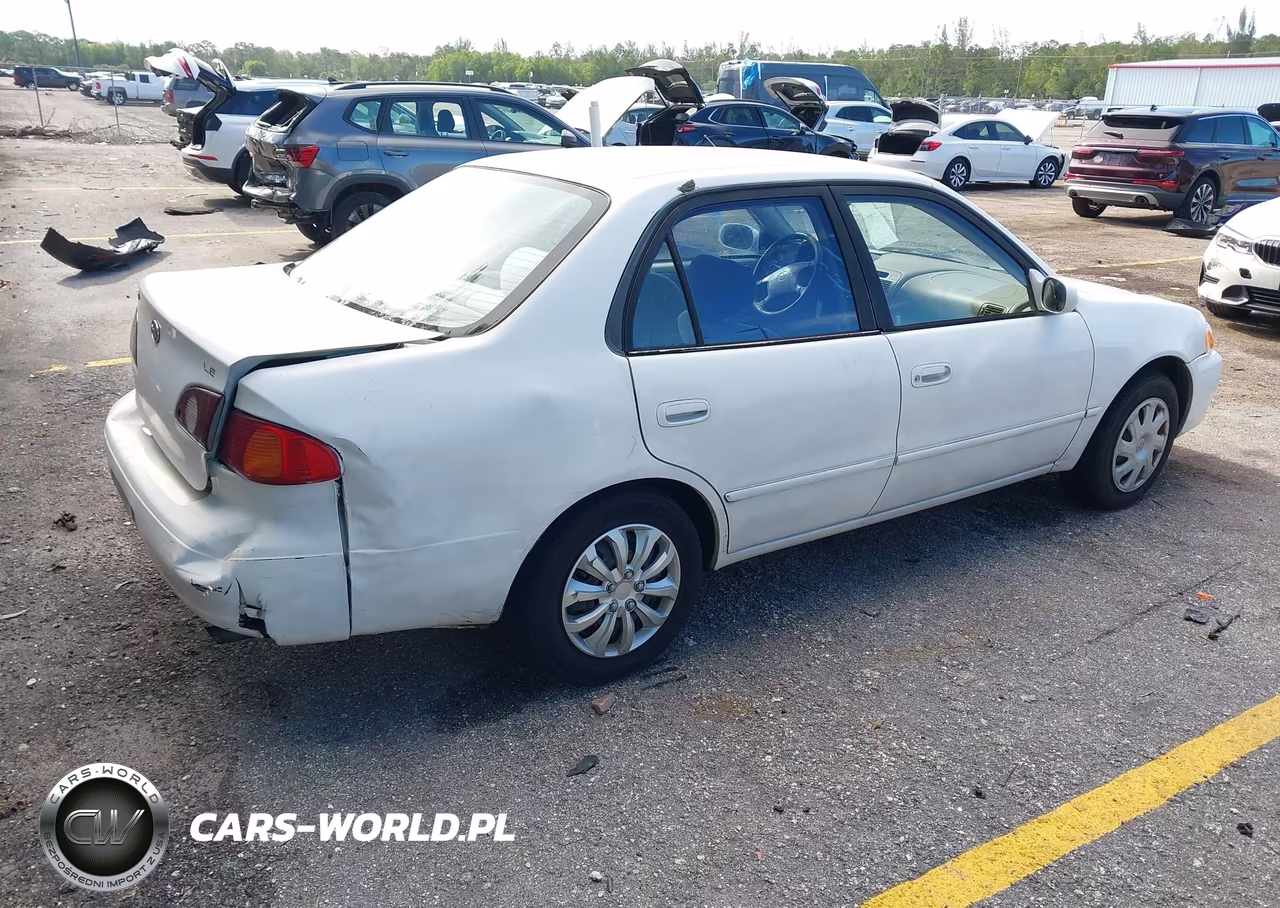 2001 Toyota Corolla Le VIN:1NXBR12E51Z563869 - 4