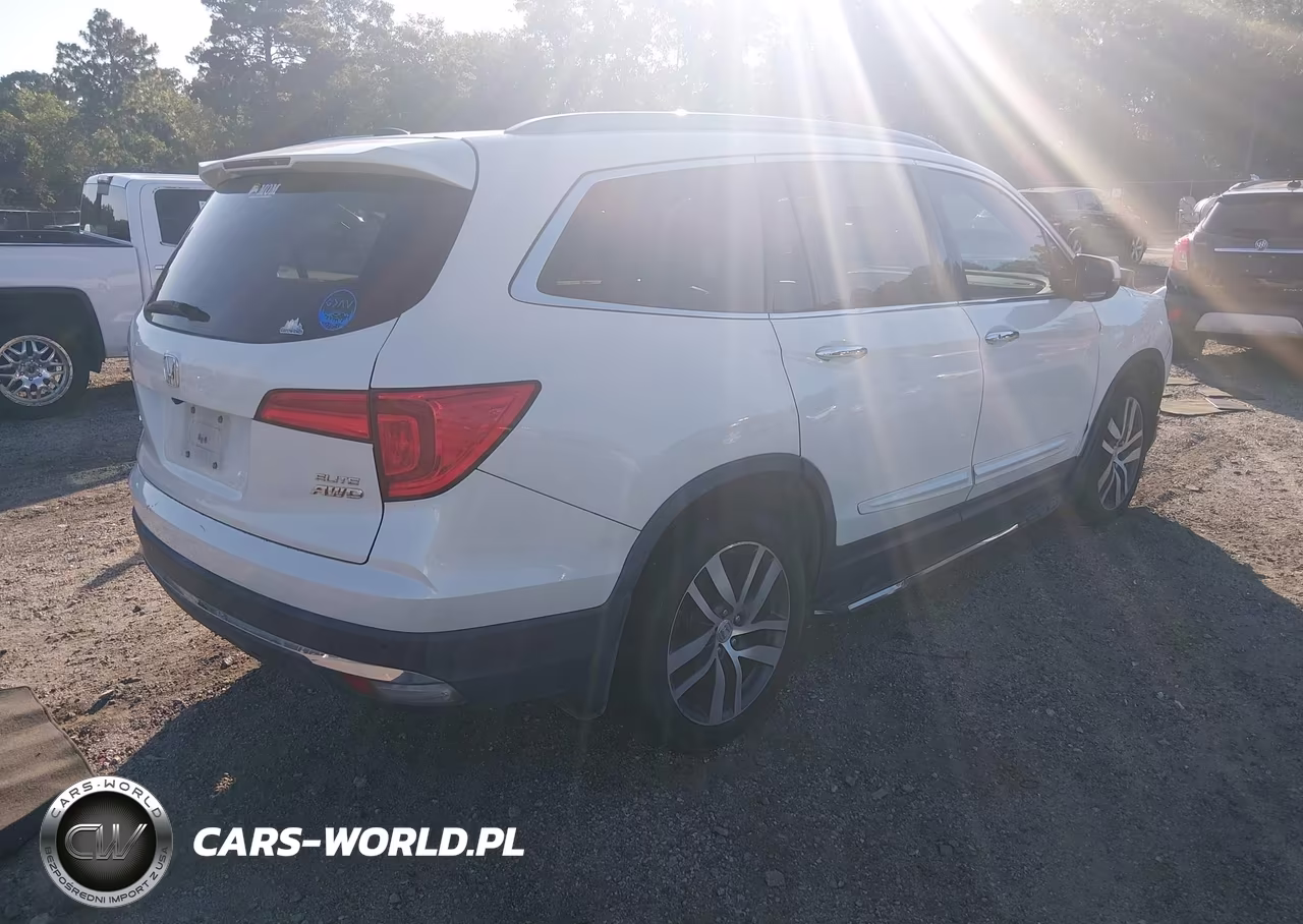 2016 Honda Pilot Elite VIN:5FNYF6H01GB106610 - 4