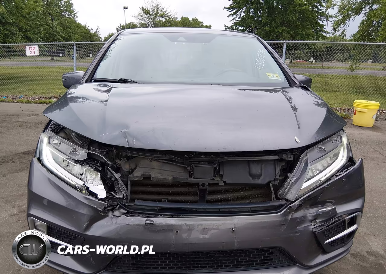 2019 Honda Odyssey Touring VIN:5FNRL6H80KB061820 - 12