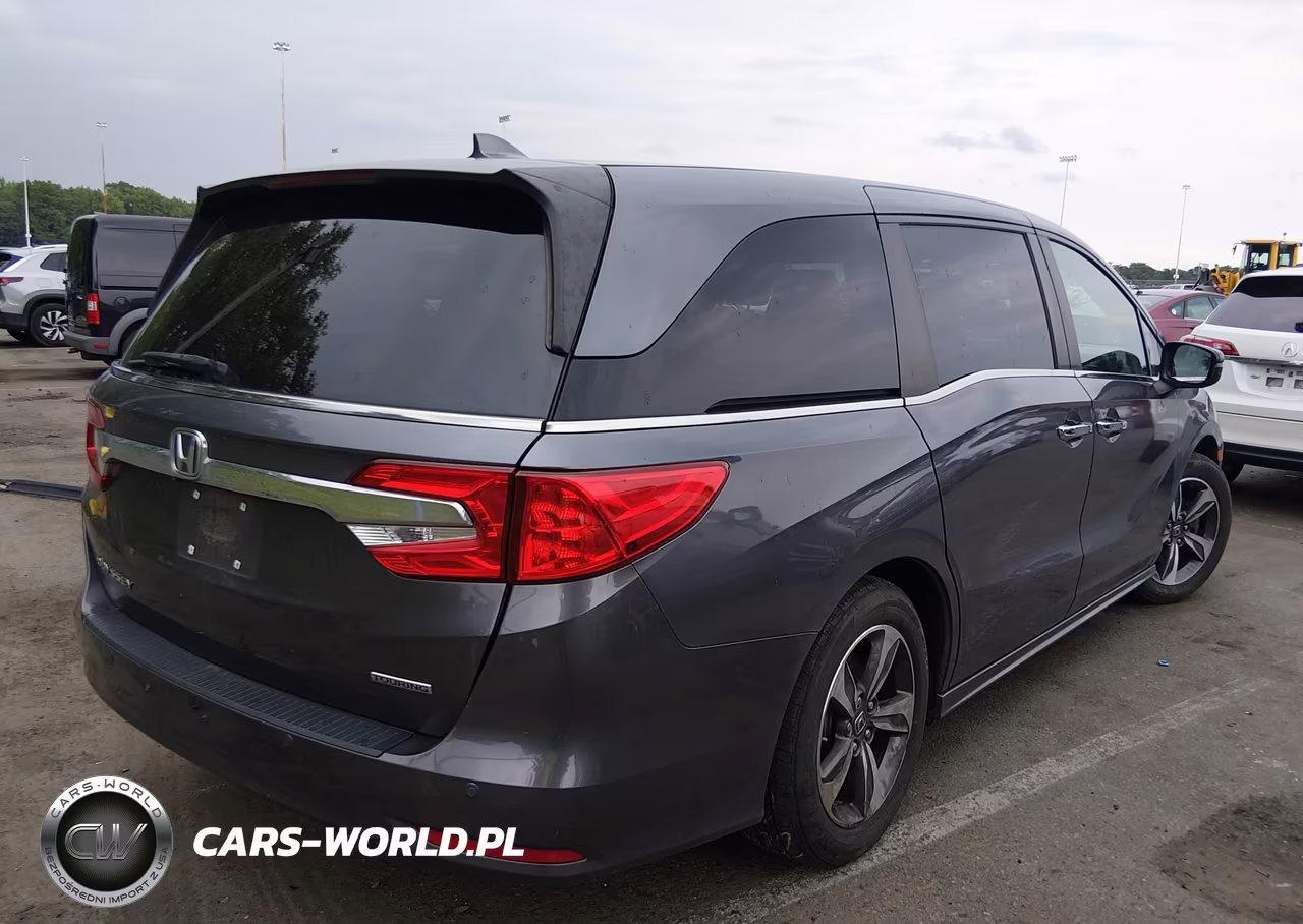2019 Honda Odyssey Touring VIN:5FNRL6H80KB061820 - 4