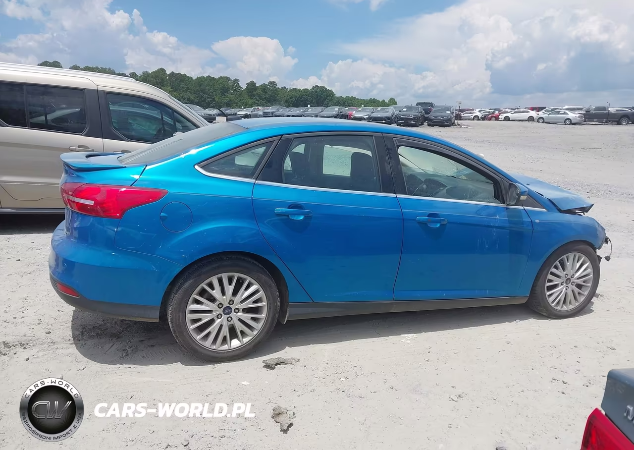 2016 Ford Focus Titanium VIN:1FADP3J24GL242612 - 12